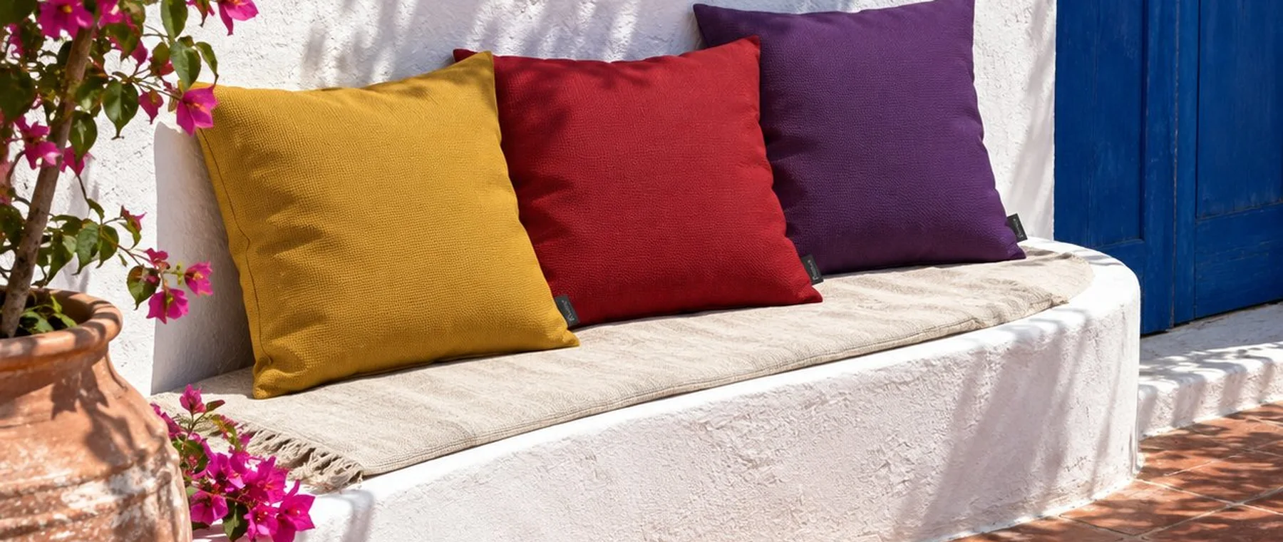 Mediterranean terrace with colourful Sunbrella cushions